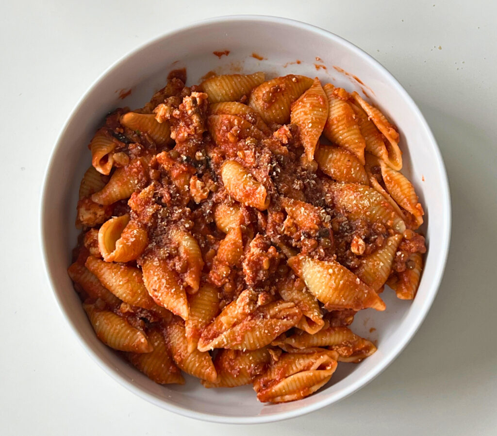 Quick Tofu and Lentils Bolognese bowl with shell pasta