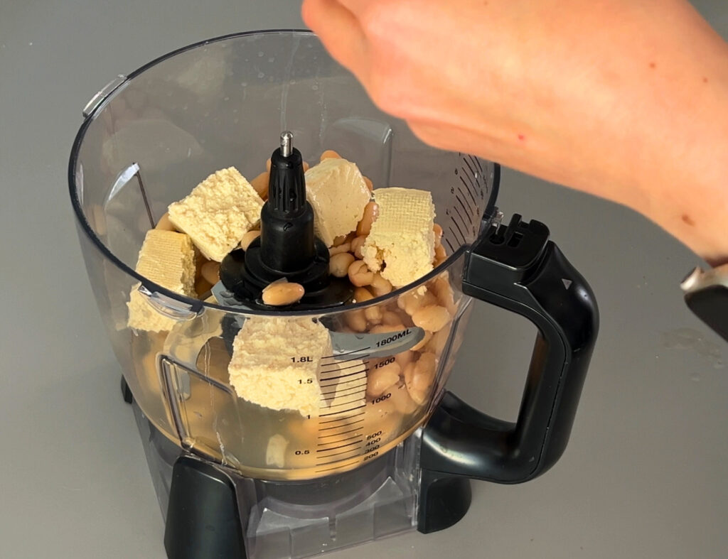 Blend the base (tofu and white beans)