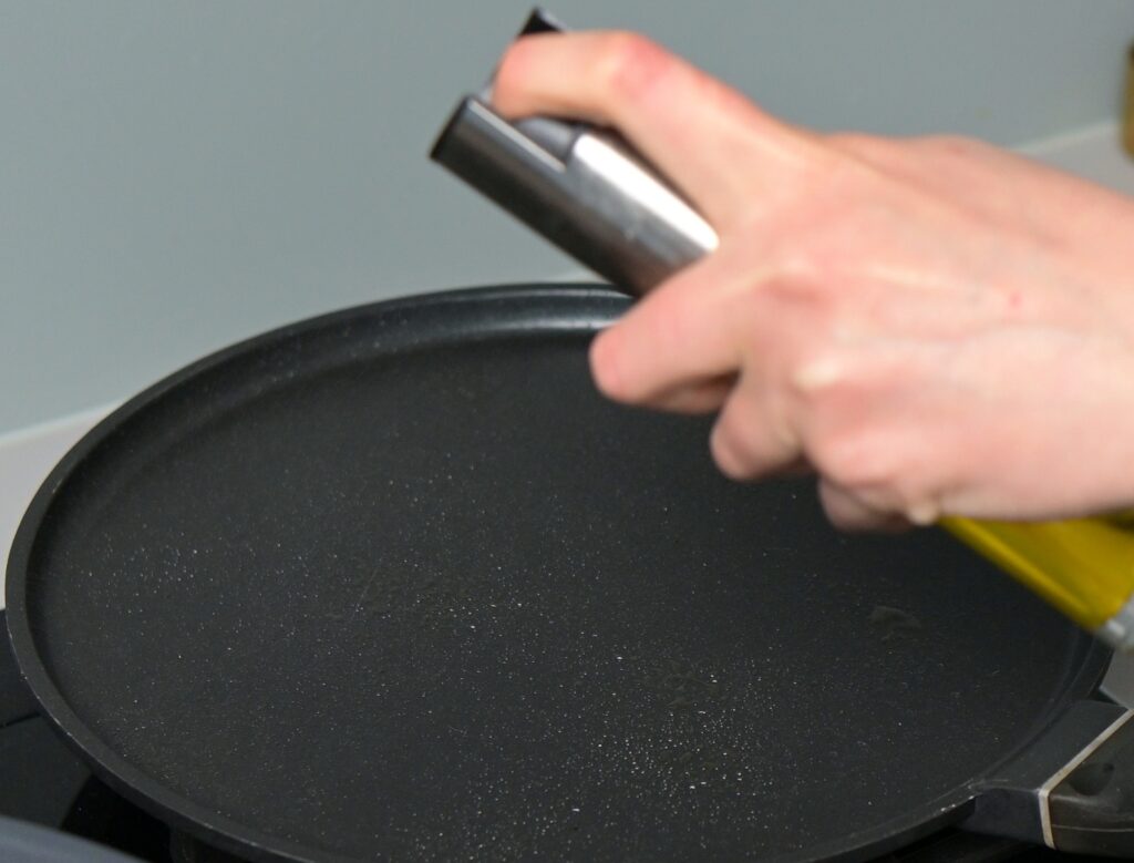 lightly coat with olive oil