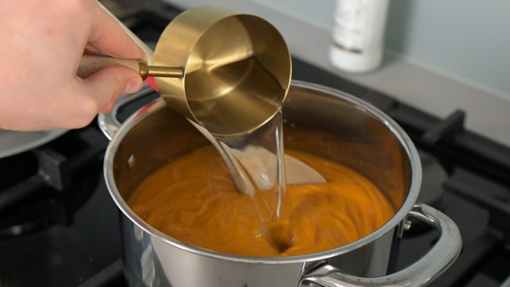 Pour the blended soup into a pot