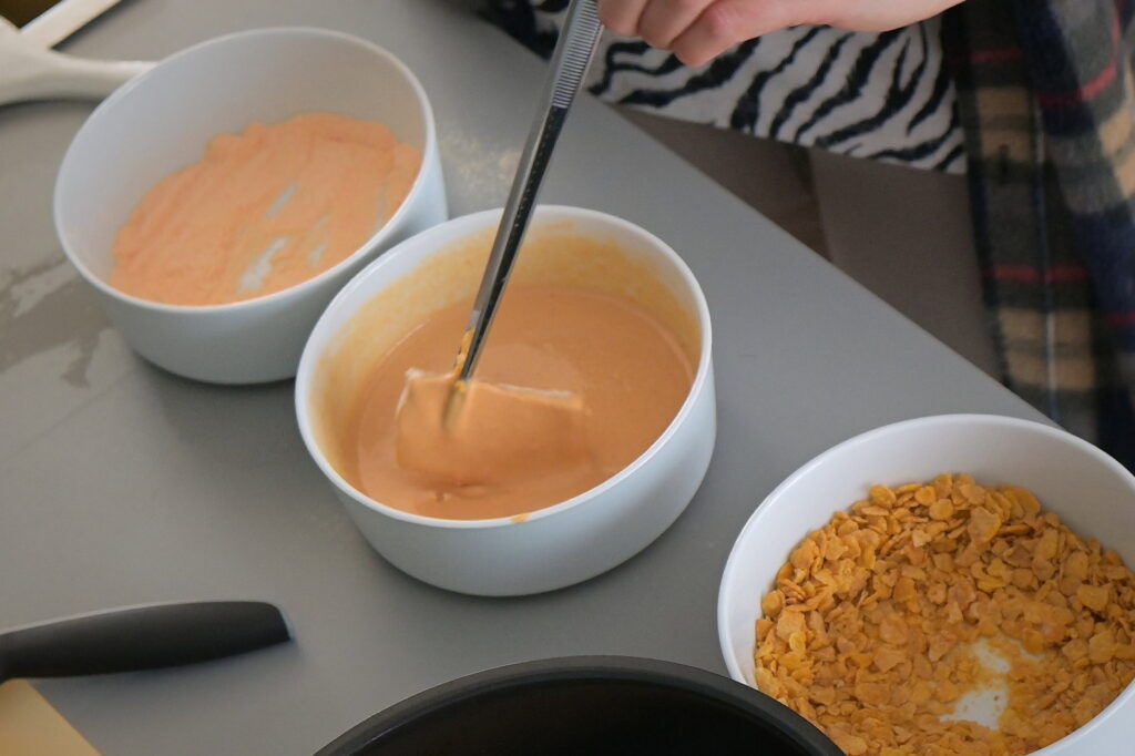 Dip tofu into batter