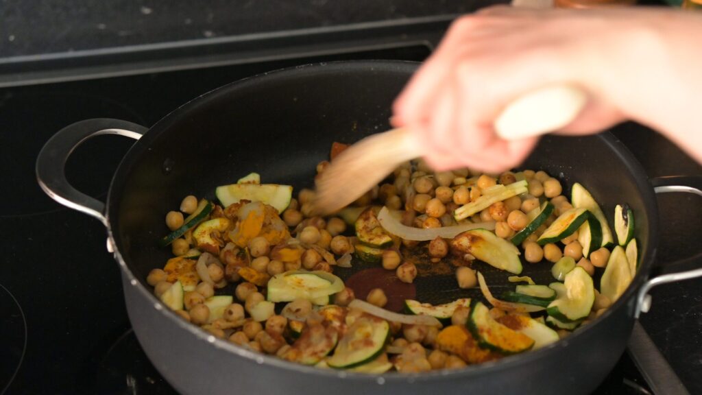Add the chickpeas and spices